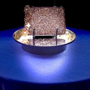 Kate Spade Glittery Card holder. New w/o box. MSRP $89.00. Price: $35.00.